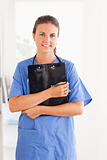 Cute nurse holding a folder