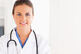 Portrait of a beautiful brunette doctor with a stethoscope