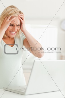 Upset woman with notebook