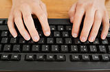 Typing woman on keyboard