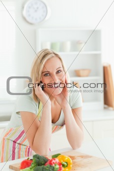 Gorgeous woman on phone looking into the camera