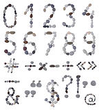 collection of letters and numbers of sea stones