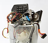 electronic parts from computers in trash can