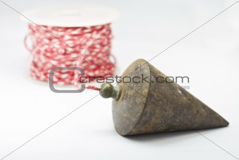 plumb bob with on white background