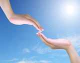 two hand touch isolated on blue sky