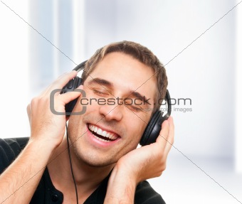Smiling man listening the music