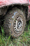 Muddy car tire