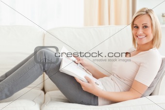 Young woman with a magazine