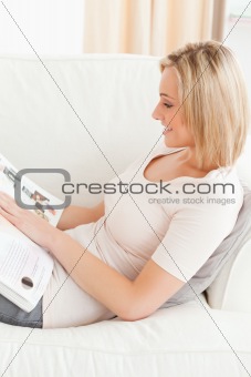Close up of a woman reading a magazine
