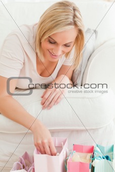 Close up of a woman looking in her shopping bags