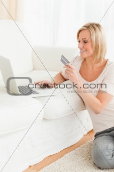 Portrait of a woman booking her holidays online