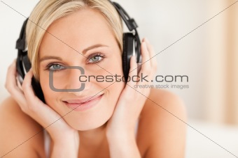 Close up of a woman wearing headphones