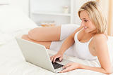 Calm woman using a laptop