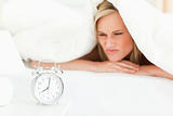 Dissatisfied blonde woman waking up