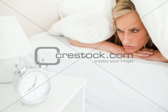 Displeased woman waking up
