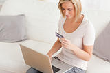 Close up of a woman shopping online