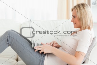 Blonde woman surfing on the internet