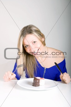 Young happy woman with cake