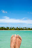 Feet, water and exotic beach