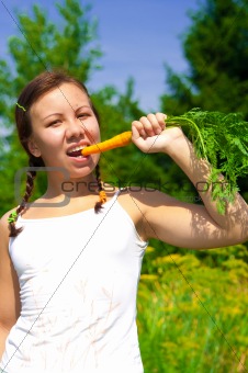Woman eating Carrot