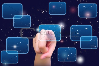 hand pushing a button on a touch screen interface under starry night sky