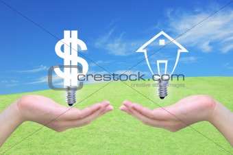 light bulb dollar symbol exchange light bulb model of a house in women hand on sky