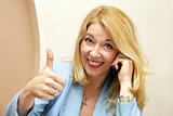 Businesswoman showing ok sign