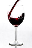 wineglass pouring red wine