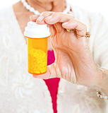 Senior Holding Prescription Pills