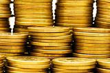 Close up of stack of gold coins