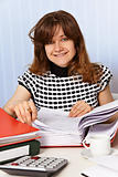 Woman is working with financial documents