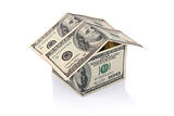 House built with Dollar money bills isolated with clipping path
