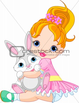Little girl hugging toy bunny 