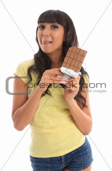 Pretty girl holding chocolate licking lips