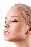 blond girl make up with gem stone