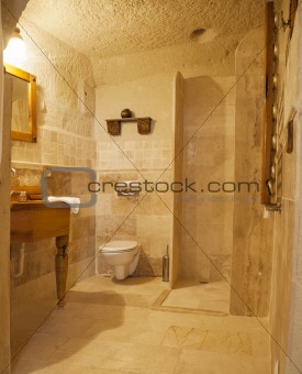 shower room detail with marble tiling