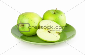fresh green apple on a plate