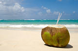 Coconut drink on exotic beach