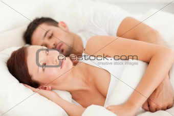 Woman waking for the sound of snores