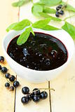 black currant  jam  with mint leaves