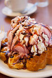 Waffles with ice cream and whipped cream