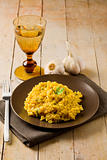 Risotto with Saffron on wooden table