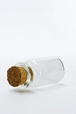 Empty glass bottle with cork stopper 