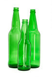Three green glass bottles