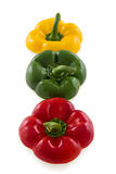 Three colorful pepper bell tops