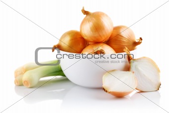 onions vegetables in white plate with cut