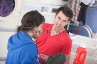 Smiling Man In Laundromat