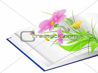 open book with flowers and green grass