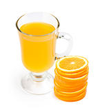 glass of juice and orange slices