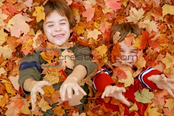 Boys Playing in the Leaves